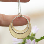 Load image into Gallery viewer, OOAK • Crescent moon pendant in silver &amp; brass #26 (ready to ship)
