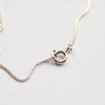 Afbeelding in Gallery-weergave laden, Pendant in brass and silver ~ brass half circle on silver line    (made to order)
