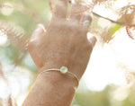 Lade das Bild in den Galerie-Viewer, OOAK • Adjustable silver cuff bracelet with oval prehnite (in stock, ready to ship)
