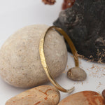 Load image into Gallery viewer, Simple brass cuff with hammered center ~ D shaped band   (Made to order)
