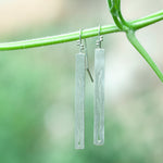 Afbeelding in Gallery-weergave laden, Long silver earrings with branch cut out    (made to order)
