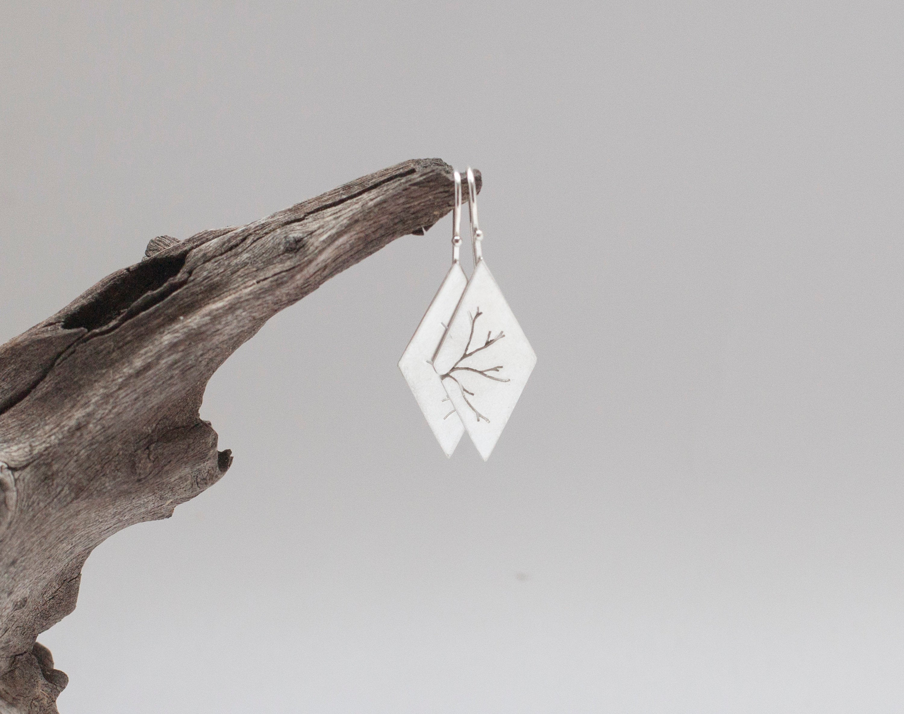 Dangling earrings in silver with cut out branch    (made to order)
