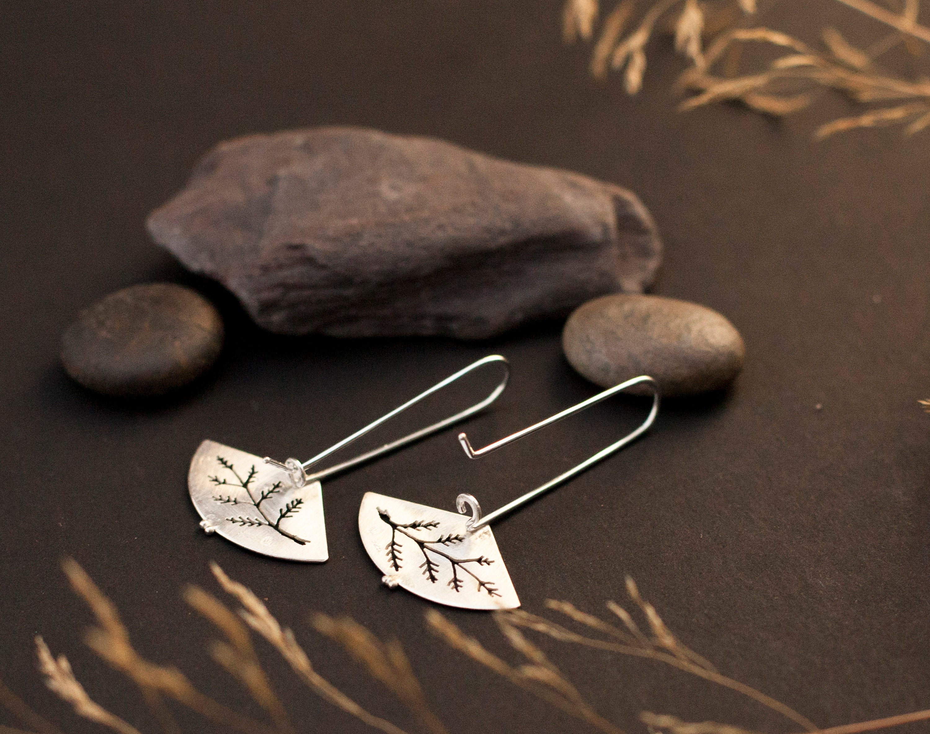 Dangling silver earrings in silver with fern out cut    (made to order)