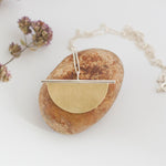 Load image into Gallery viewer, Pendant in brass and silver ~ brass half circle on silver line    (made to order)
