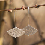 Load image into Gallery viewer, Dangling silver earrings in silver with fern out cut    (made to order)
