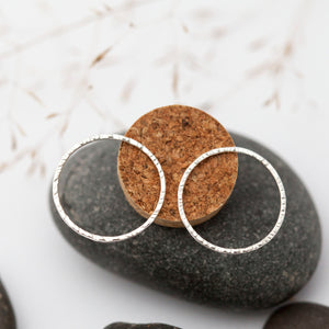 Hammered circle earrings in silver    (made to order)