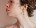 Load image into Gallery viewer, Dangling earrings in silver with cut out branch    (made to order)
