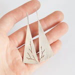 Load image into Gallery viewer, Long triangle earrings in silver with asymmetrical branch cut out    (made to order)
